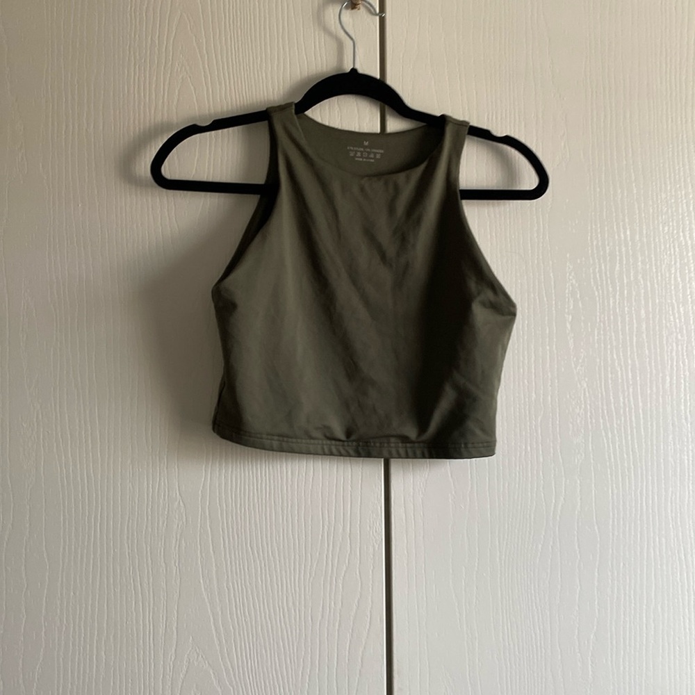 Olive green crop top with a halter type neck line.